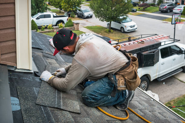 Professional Gutter Installation technician working in Ambler, PA